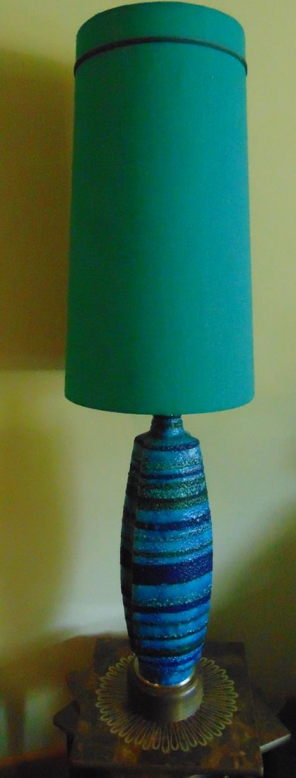 Stunning late 50s early 60s Raymor style pottery table: Stunning late 50s early 60s Raymor style pottery table lamp on walnut base with original shade of monumental size. With shade it measures 53" tall, the pottery is 28" tall.