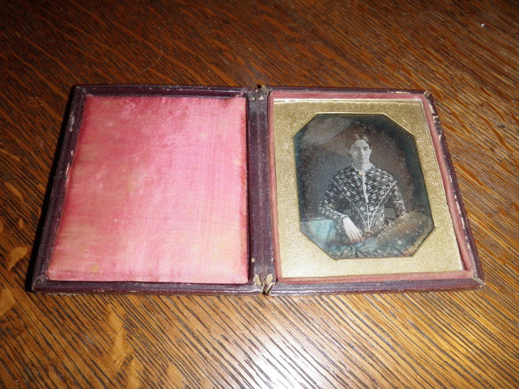 Daguerreotype: Young Lady with a checkered skirt has tarnish 2 3/4" x 3 1/4"