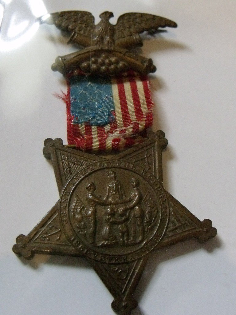 Medal, Grand Army of Repub.: Grand Army of the Republic Civil War Veterans Medal, Serial #V4870, Bronze with Flag Ribbon, 3 1/4" length, Ribbon has small tear in lower section