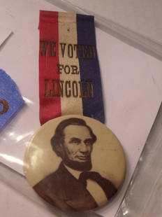 Lincoln Celluloid Pin: We Voted For Lincoln political pin with red, white and blue ribbon. Celluloid pin has likeness of Lincoln on it. ;