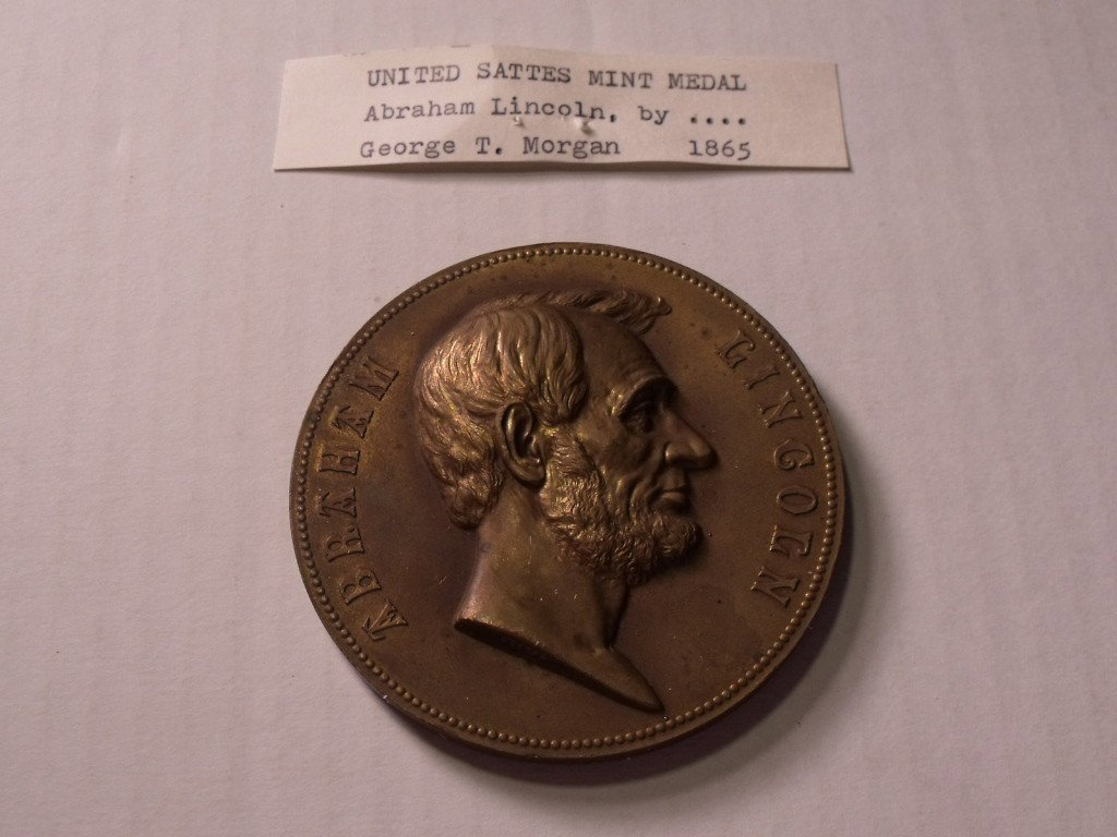 US Mint Medal Abraham Lincoln: Medal is marked Abraham Lincoln along with a relief of Abraham Lincoln, Morgan is stamped on his neck. The reverse side reads, "Inaugurated President of the United States March 4, 1861 Second Term Mar