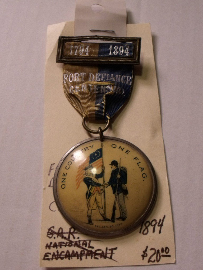 Fort Defiance Centennial Medal: 1794-1894 Fort Defiance Centennial medal/ribbon. "One Country One Flag". Pat. Jan 30, 1894. Fort Defiance Ohio souvenir.