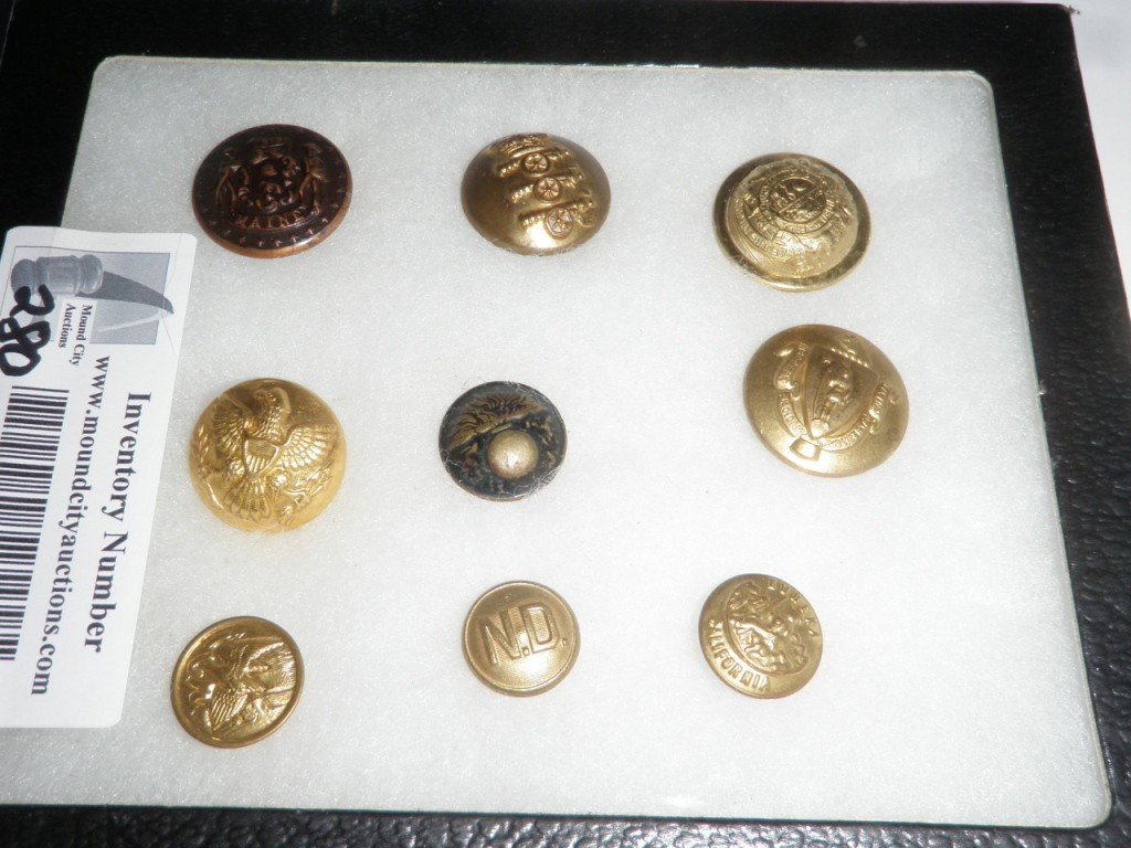 Collection Military Buttons: Assorted collection of antique military buttons. There are a total of 9 buttons in this lot.