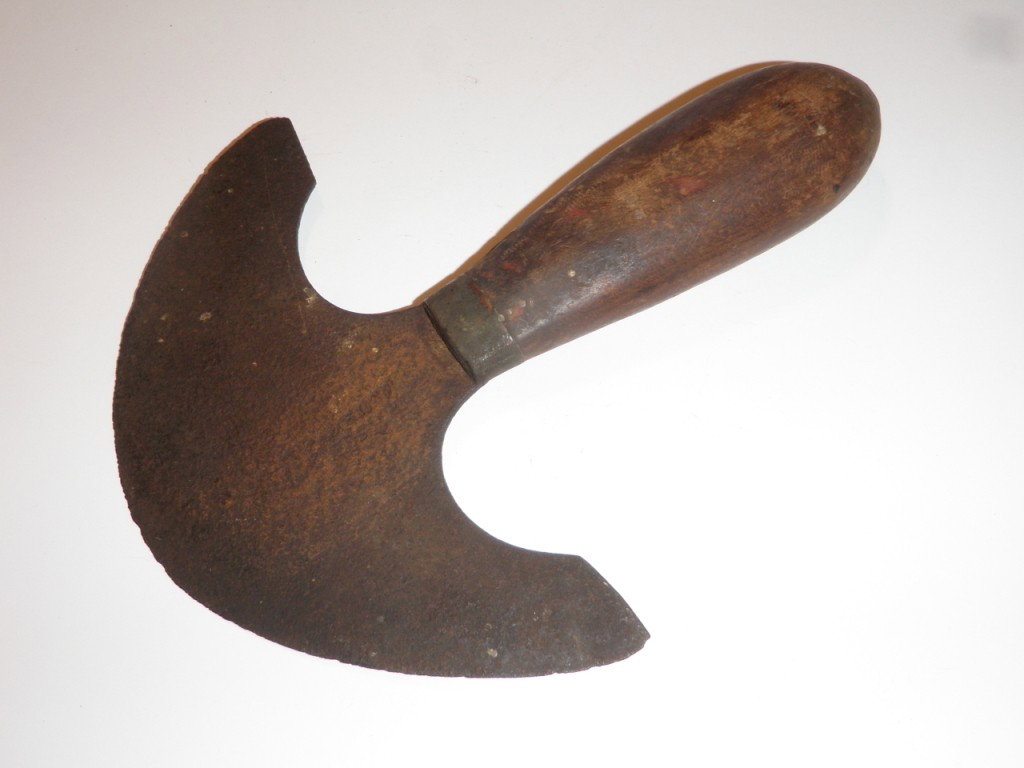 Antique Saddle Tool: Marked, we can make out rose and then a word with an E under it. Appears to have been "rubbed" where the wording is, probably so the person could read the lettering better. Measures about 6 3/8" long.