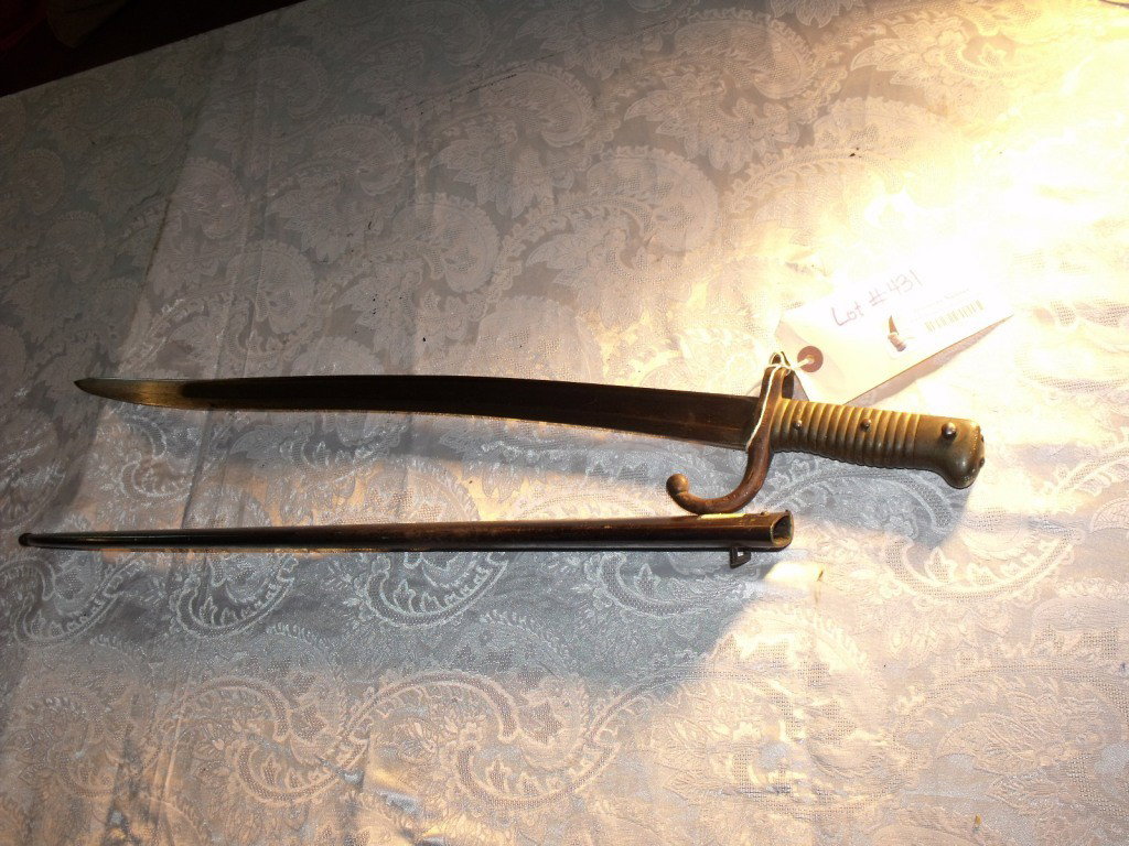 Bayonet, French: Model 1866 French Chassepot Bayonet, Dated May 1875, Made at the St. Etienne Armory in France, Bayonet handle & blade in very good condition, serial number 16945, Scabbard has matching serial number o