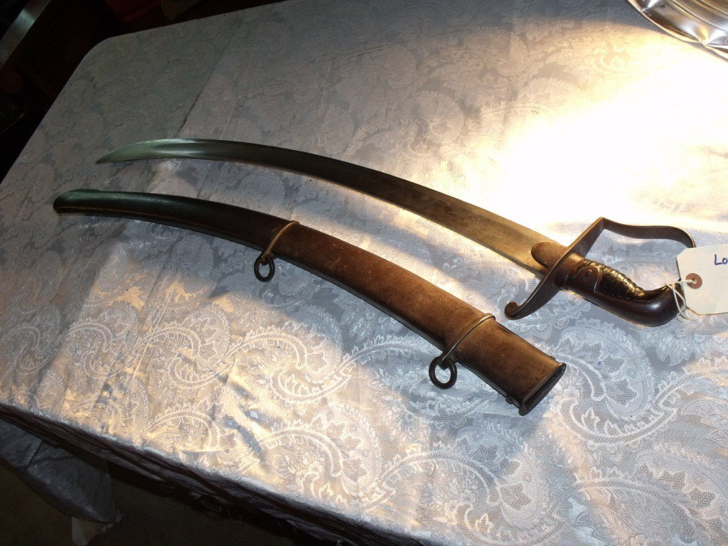 Saber, British: Model 1796 Light Cavalry Saber, Made by Thomas Craven of Birmingham, Blade in very good condition with maker's name clear, Scabbard in very good condition with no dents or rust. Excellent example of t