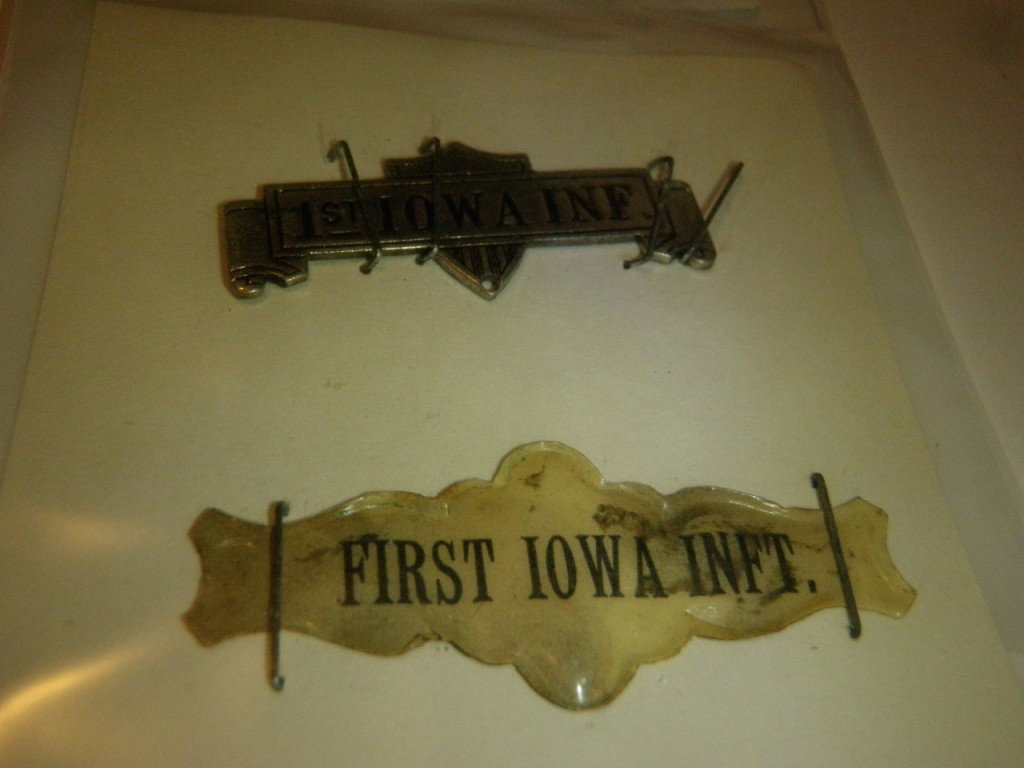 Pair of 1st Iowa Infantry Badges: Pair of badges marked "1st Iowa Inf." and "First Iowa Inft.".