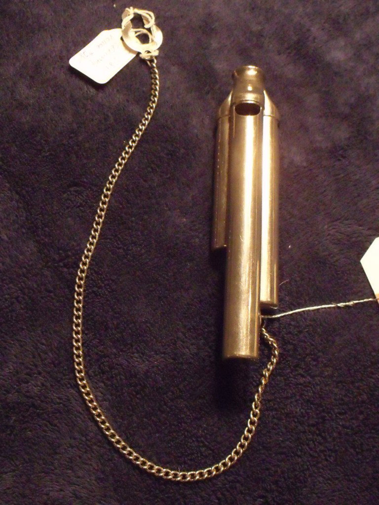 Vintage German Police Whistle: 3 tubed whistle on chain, marked "Germany" on bottom of one of the tubes.