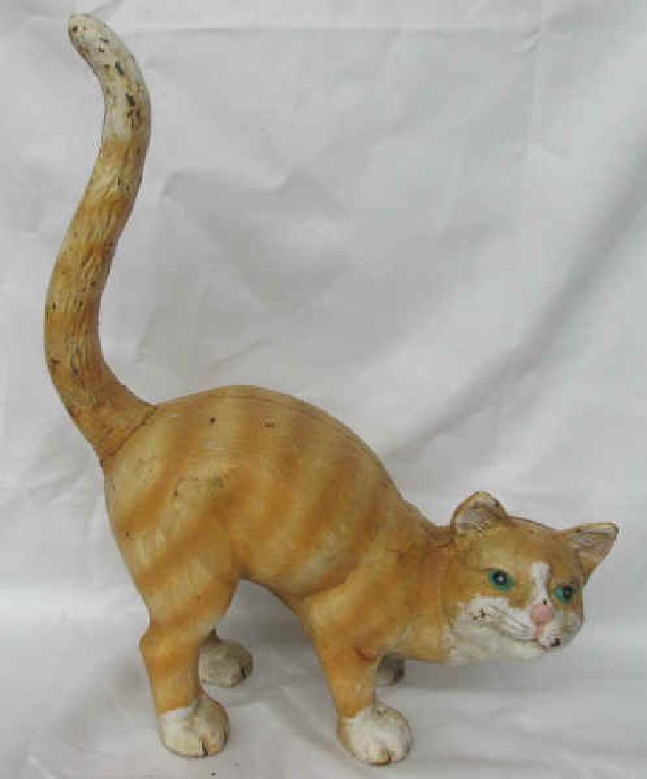 Full Body Preening Cat Door Stop in Excellent Condition: Full Body Preening Cat Door Stop in Excellent Condition There are a couple of minor paint loss spots. It is 10 inches by 12 inches. Hubley made a similar one but not as well defined. It is shown in Be