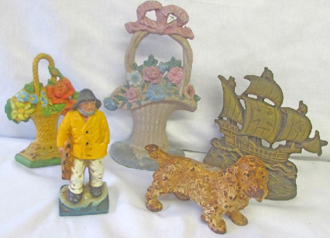 Group of Two Iron Door Stops and Three Paper Weights (1 of 4)