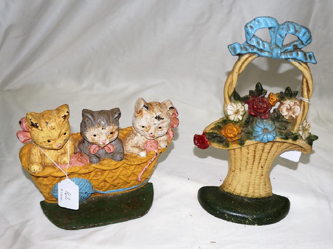 Two Doorstops: Basket of Flowers with Bow and Three: Two Doorstops: Basket of Flowers with Bow and Three Kittens in a Basket The basket of flowers is 11 inches tall in excellent condition. The three kittens in a basket door stop is 9 inches long and was
