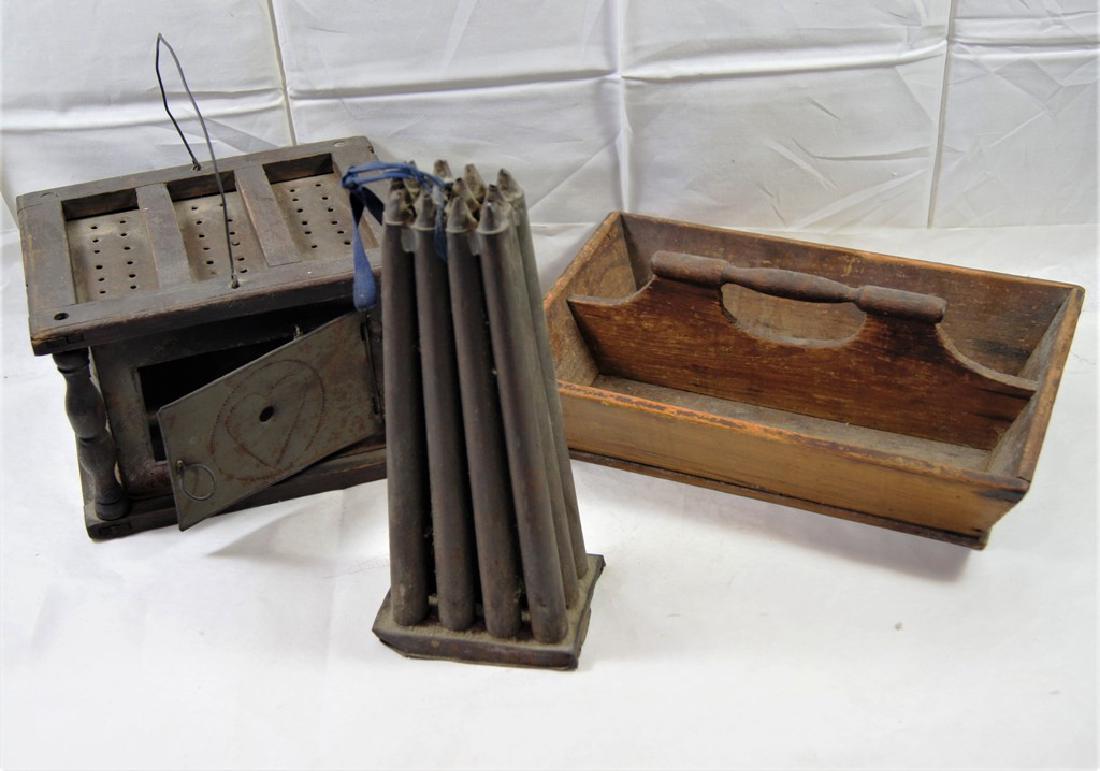 Lot of 3 primitives incl 12 stick candle mold, pilgrim: Lot of 3 primitives incl 12 stick candle mold, pilgrim era footwarmer with punch tin heart-design sides and turned oak pillars, along with a primitive red stained handled cutlery box
