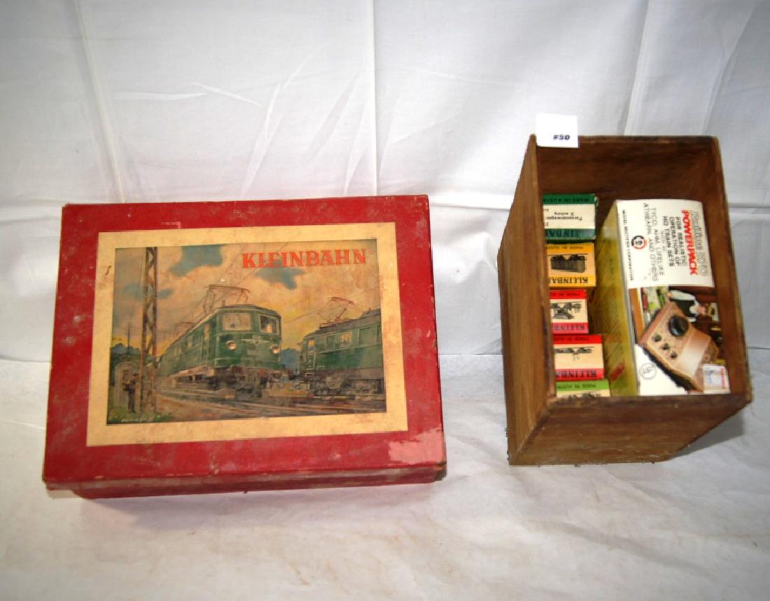 Kleinbaum HO train set in original box with a modern: Kleinbaum HO train set in original box with a modern transformer, a 0-6-0 Engine and 8 other assorted cars incl 313 oil car, 318 covered wagon, , original box is nice with picture cover label, comes c