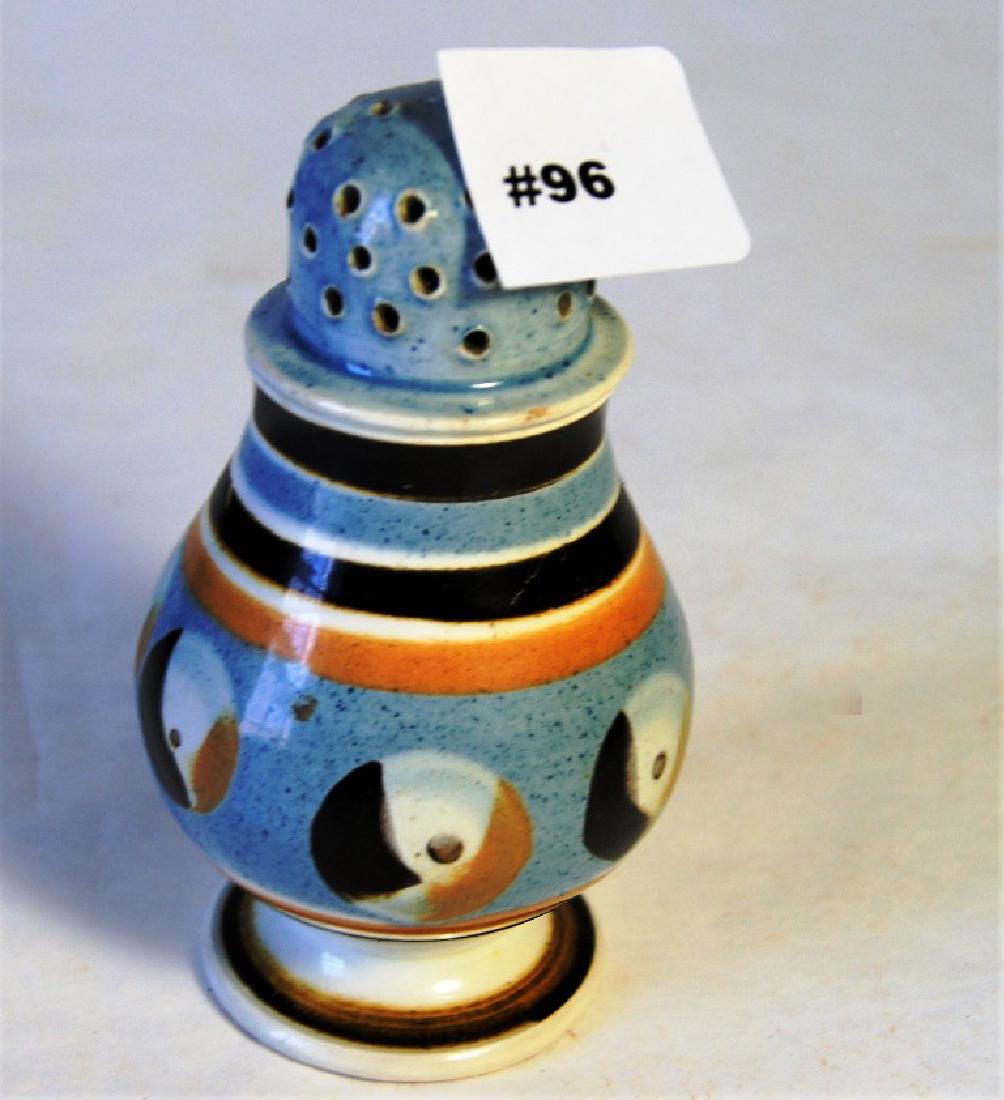 Mid-19th c. Mochaware castor with cat's eye and blue,: Mid-19th c. Mochaware castor with cat's eye and blue, brown, and cream slip decoration. Each piece of mochaware is unique. A Castor is a container with perforated cap for sprinkling though these are o