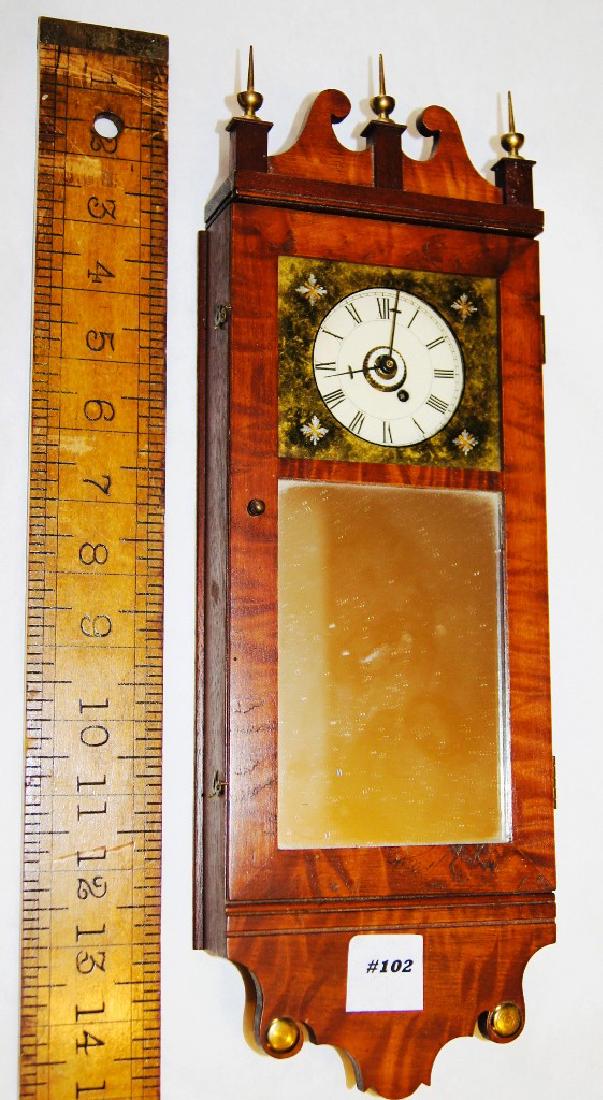Michael Paul mini NH Mirror Clock w/alarm weight driven: Michael Paul, Berea, OH Miniature birch replica of a New Hampshire mirror clock, No. 15 of a limited edition of 15, with weight powered time and alarm movement, ht. 15", Each year Paul produced a limi