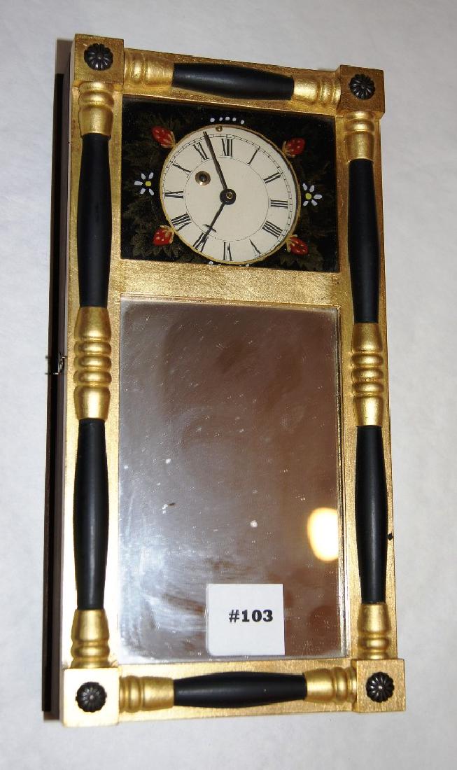 Michael Paul, Berea, OH Mini black/gilt NH mirror clock: Michael Paul, Berea, OH Miniature black painted and gilt replica of a NH split column door mirror clock, No. 12 of a limited edition of 16, with weight powered time movement, ht. 15", Each year Paul p