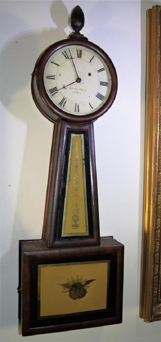 Mahogany Willard Patent Banjo Clock, 7" enamel painted: Mahogany Willard Patent Banjo Clock, 7" enamel painted metal dial inscribed "Sylvester Edgerly / Roxbury", ca 1830, with black Roman hour numerals with winding hole at 2, a wood acorn finial at top, m