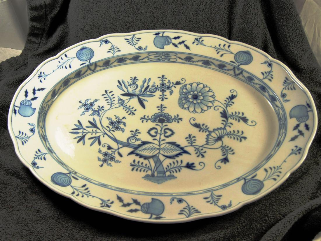 Meissen "Blue Onion" porcelain platter, ca 1870, 18": Meissen "Blue Onion" porcelain platter, ca 1870, 18" wd., 23" lg., Crossed sword marked in blue ink, with some incised marks as well. Excellent condition, no chips, cracks or repairs.