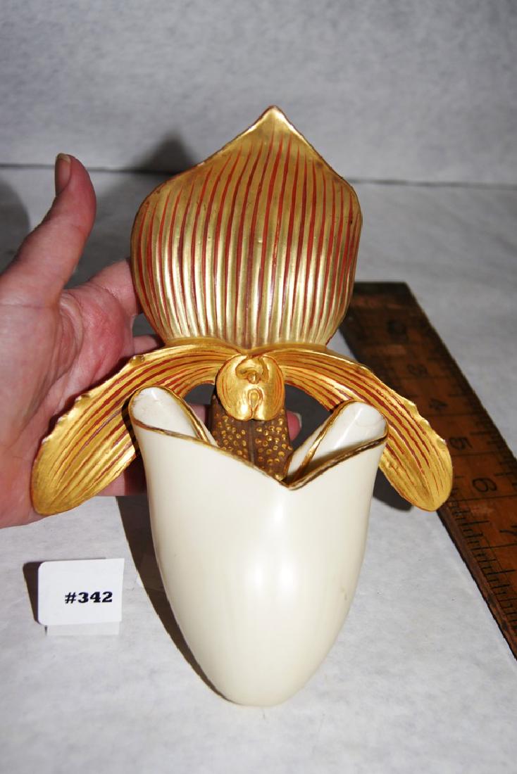 Royal Worcester hanging wall pocket vase in the shape: Royal Worcester hanging wall pocket vase in the shape of a lady slipper with gold leaf decoration, green mark, 6" ht.