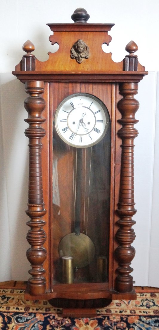 Lenzkirch Vienna Regulator wall clock, 2 brass weights: Lenzkirch Vienna Regulator wall clock, 8 day, time/strike weight driven movement with 2 pc. white porcelain dial, in an orig. finished carved walnut case with brick design "castle" pillars flanking th