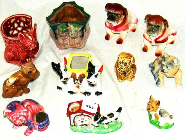 11 bulldog planters & figurines, nice colors, incl: 11 bulldog planters & figurines, nice colors, incl 3 planters, 2 toothpicks & coaster rack and other figurines, 2" - 5" ht., ca 1920-30, Cond.: VG overall