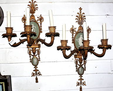 Pr of Neo-classical wall sconces w/sgd Wedgwood panels: A Pair of Continental Gilt Bronze Wall Sconces , each with three arms with elec candle lights, their pendant draperies centering signed Wedgwood jasper plaques in green with classical Greek figural mo