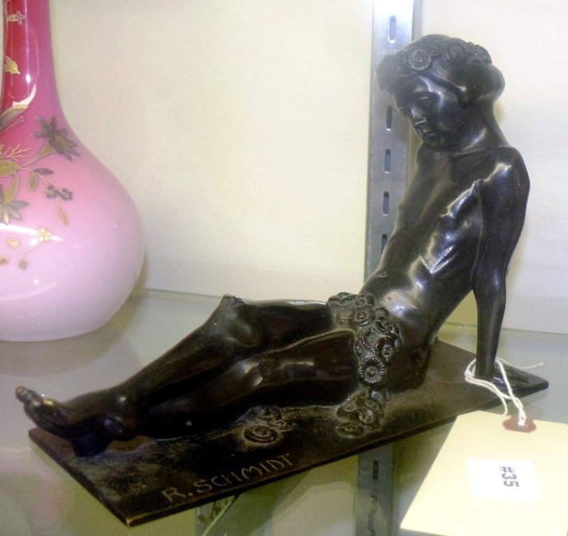 Bronze sgd R. Schmidt of reclining nude: Bronze sgd R. Schmidt of reclining nude, there was a small applied butterfly on the knee that has gone missing