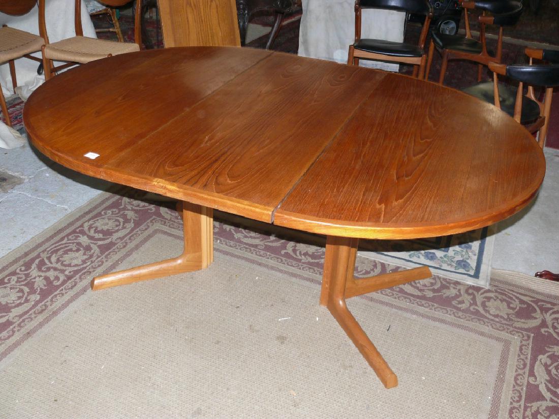 Danish modern Gudme Mobel Fabrik dining table w/lvs: Danish modern expandable round dining table w/2 leaves, sgd Gudme Mobel Fabrik (Niels Moller, 1950s), 48" round and each of 2 leaves measuring ea. 20" wide, nice original finish
