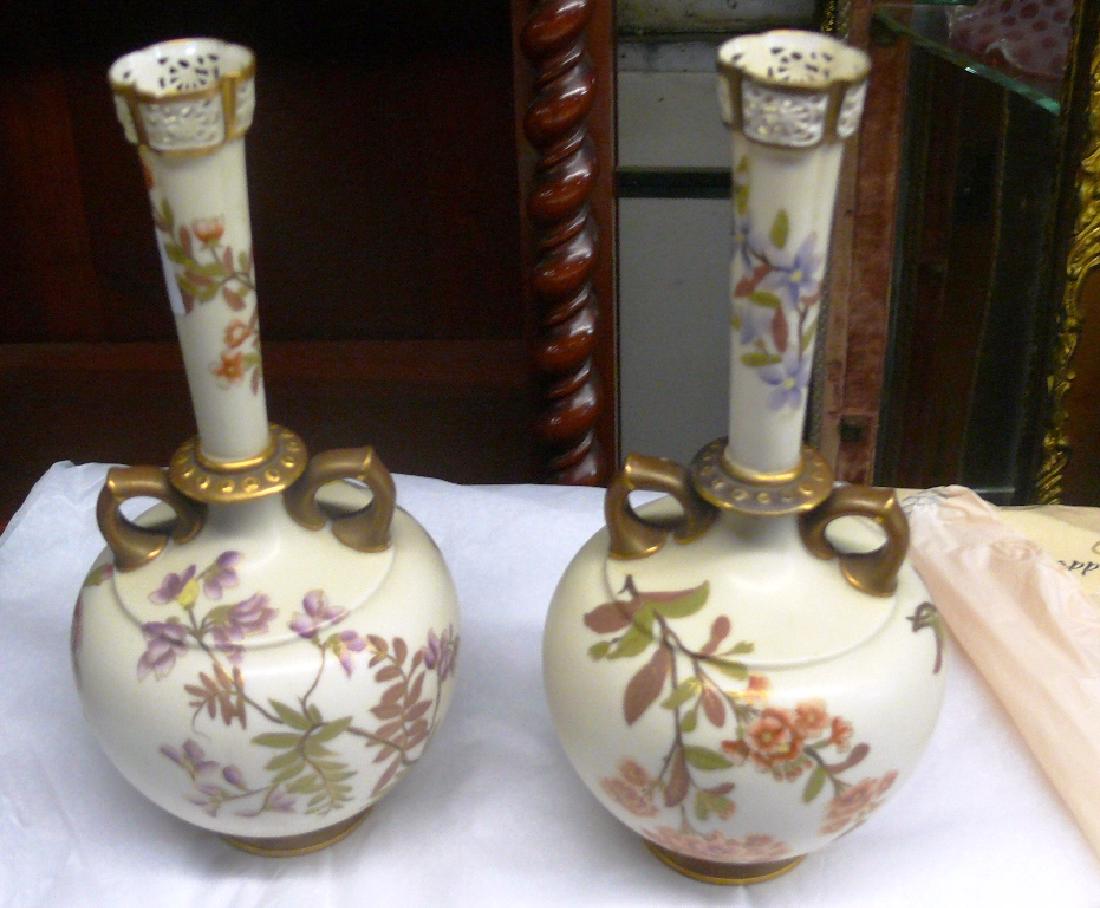 Pair of Royal Worcester flower vases, as is: Pair of Royal Worcester flower vases, one hard to see repair in neck near gold lozange ring, almost missed it, the other has a tiny chip on top edge, both seemed perfect until magnified inspection, 10