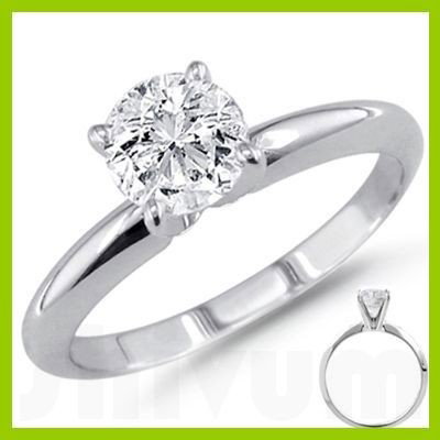 0.90 ct Round cut Diamond Solitaire Ring, F-G, SI2: Diamond count: 1 ROUND CUT Diamond weight: 0.9ctw Diamond color: F-G Diamond clarity: SI2 Metal: 14K White Gold Ring size: 6.5 Availability: 3 Business days, ready to ship