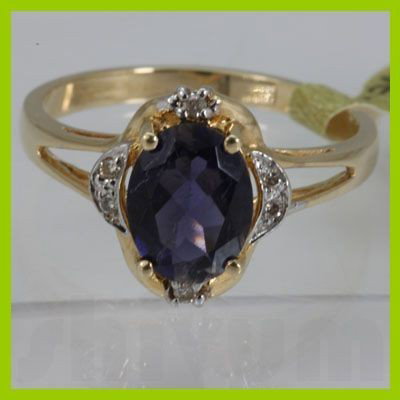 Genuine 1.44 ctw Iolite Ring 14KT Yellow Gold: Main Stone: Iolite ; Carat Weight: 1.44ctw ; Gold Carat:14KT; Metal: Yellow Gold ; Ring Size: 7 ; Diamond Weight: 0.05 ; Gemstone Carat Weight: 1.39; Cut: OVAL ; MSRP: $326