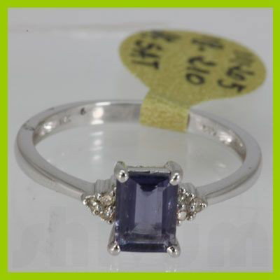 Genuine 0.81 ctw Iolite Ring 14KT White Gold: Main Stone: Iolite ; Carat Weight: 0.81ctw ; Gold Carat:14KT; Metal: White Gold ; Ring Size: 7 ; Diamond Weight: 0.05 ; Gemstone Carat Weight: 0.76 ; MSRP: $220