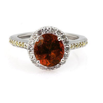 Genuine 2.20 ctw Garnet (Mozambique) Ring 14k: Genuine 2.20 ctw Garnet (Mozambique) Ring 14k **|**|** Gemstone: Garnet (Mozambique) ; Total CTW: 2.2 CTW ; Metal Purity: 14KT ; Metal: White or Yellow Gold ; Dimension: 9X7MM ; Diamond Count 1: 8 ROU