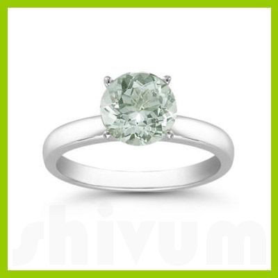 Genuine 1.30 ctw Green Amethyst Solitaire Ring 14kt: Genuine 1.30 ctw Green Amethyst Solitaire Ring 14kt **|**|** Ring Aquamarine AA-AAAAqua Round 1 Round Cut @ 0.85 ctw 3.214ktWhite 6.5 ; Availability: 3-10 Business days, ready to ship, with certificat