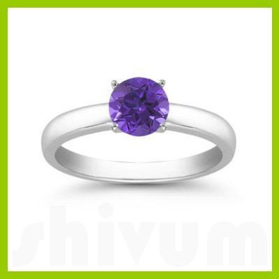 Genuine 0.55 ctw Tanzanite Solitaire Ring 14kt: Genuine 0.55 ctw Tanzanite Solitaire Ring 14kt **|**|** Ring Tanzanite AA-AAAPurple Round 1 Round Cut @ 0.55 ctw 3.214ktWhite 6.5 ; Availability: 3-10 Business days, ready to ship, with certification 