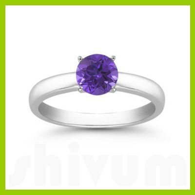 Genuine 0.40 ctw Tanzanite Solitaire Ring 14kt: Genuine 0.40 ctw Tanzanite Solitaire Ring 14kt **|**|** Ring Tanzanite AA-AAAPurple Round 1 Round Cut @ 0.40 ctw 3.214ktWhite 6.5 ; Availability: 3-10 Business days, ready to ship, with certification 