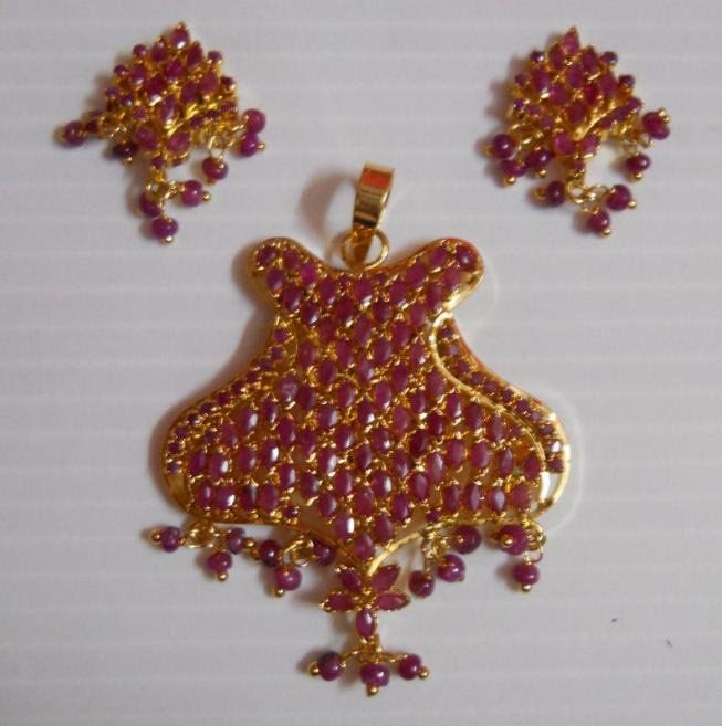 95.20 CTW GOLD PLATED RUBY SET: 95.20 CTW GOLD PLATED RUBY SET **|**|** 95.20 CTW GOLD PLATED RUBY SET ; MSRP: $300
