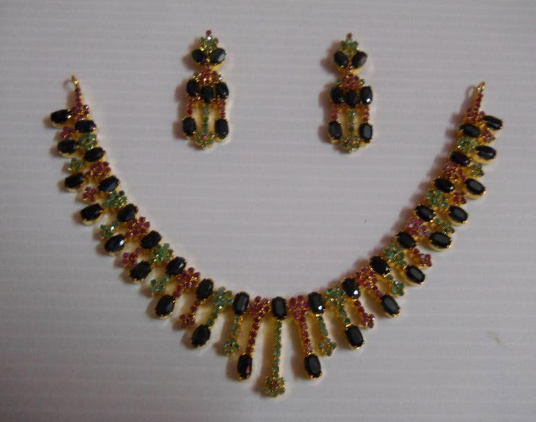 203.20 CTW GOLD PLATED EMERALD/SAPPHIRE/RUBY SET: 203.20 CTW GOLD PLATED EMERALD/SAPPHIRE/RUBY SET **|**|** 203.20 CTW GOLD PLATED EMERALD/SAPPHIRE/RUBY SET ; MSRP: $315