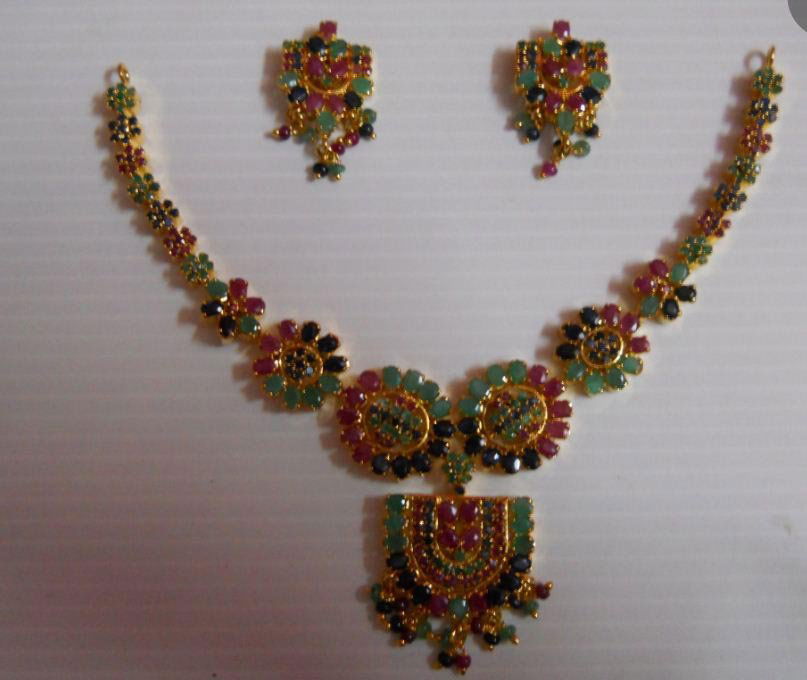 240.00 CTW GOLD PLATED EMERALD/RUBY/SAPPHIRE SET: 240.00 CTW GOLD PLATED EMERALD/RUBY/SAPPHIRE SET **|**|** 240.00 CTW GOLD PLATED EMERALD/RUBY/SAPPHIRE SET ; MSRP: $720