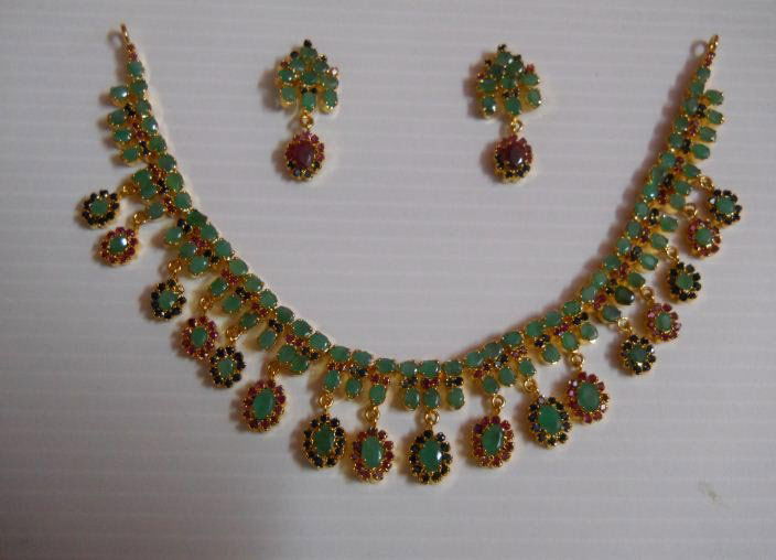 202.95 CTW GOLD PLATED RUBY/EMERALD/SAPPHIRE SET: 202.95 CTW GOLD PLATED RUBY/EMERALD/SAPPHIRE SET **|**|** 202.95 CTW GOLD PLATED RUBY/EMERALD/SAPPHIRE SET ; MSRP: $630