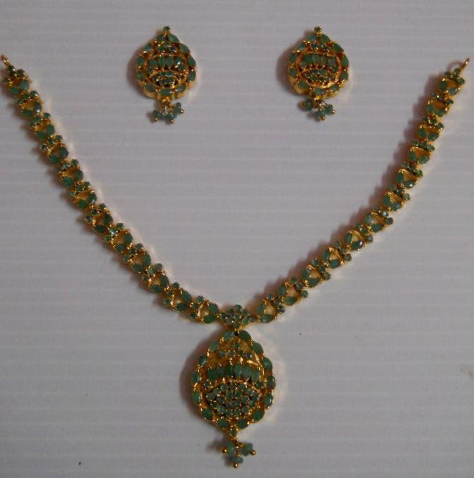 176.30 CTW GOLD PLATED EMERALD SET: 176.30 CTW GOLD PLATED EMERALD SET **|**|** 176.30 CTW GOLD PLATED EMERALD SET ; MSRP: $540