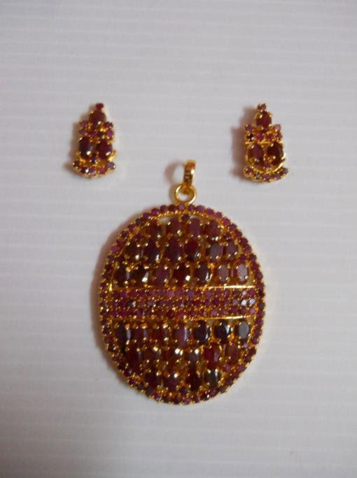 111.00 CTW GOLD PLATED RUBY SET: 111.00 CTW GOLD PLATED RUBY SET **|**|** 111.00 CTW GOLD PLATED RUBY SET ; MSRP: $1560
