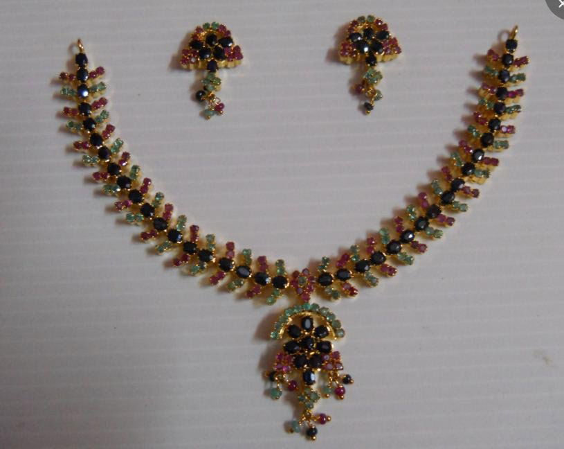 165.95 CTW GOLD PLATED RUBY/EMERALD/SAPPHIRE SET: 165.95 CTW GOLD PLATED RUBY/EMERALD/SAPPHIRE SET **|**|** 165.95 CTW GOLD PLATED RUBY/EMERALD/SAPPHIRE SET ; MSRP: $3000