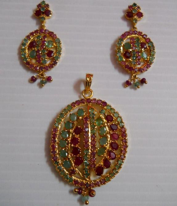 99.6 CTW GOLD PLATED EMERALD/ RUBY SET: 99.6 CTW GOLD PLATED EMERALD/ RUBY SET **|**|** 99.6 CTW GOLD PLATED EMERALD/ RUBY SET ; MSRP: $1500