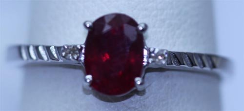 9.55 CTW RUBY AND DIAMOND RING .925 STERLING SILVER: 9.55 CTW RUBY AND DIAMOND RING .925 STERLING SILVER **|**|** 9.55 CTW RUBY AND DIAMOND RING .925 STERLING SILVER; RUBY 1.20 CTW; DIAMOND 0.02 CTW ; MSRP: $300