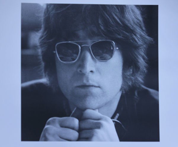 MUSIC POSTER: MUSIC POSTER **|**|** 16X16 IN; UNFRAMED; John Lennon was an English songwriter, singer and instrumentalist who gained worldwide fame as one of the founders of The Beatles. In his solo career, Lennon 