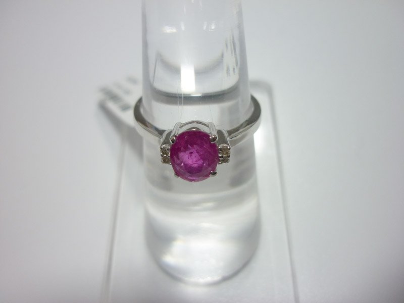NATURAL 10.25 CTW RUBY AND DIMAOND RING .925 STERLING S: NATURAL 10.25 CTW RUBY AND DIMAOND RING .925 STERLING S **|**|** NATURAL 10.25 CTW RUBY AND DIAMOND RING .925 STERLING SILVER STONE WEIGHT 1.10 CTW DIAMOND WEIGHT 0.04 CTW ; MSRP: $200