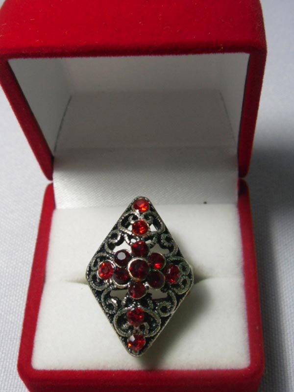 12CTW RED DIAMOND SHAPE BRASS ADJUSTABLE RING: 12CTW RED DIAMOND SHAPE BRASS ADJUSTABLE RING **|**|** 12CTW RED DIAMOND SHAPE BRASS ADJUSTABLE RING ; MSRP: $150