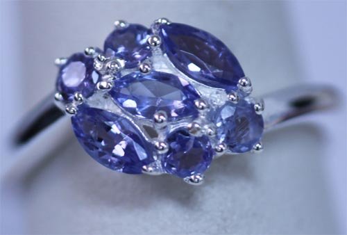 11.70 CTW TANZANITE RING .925 STERLING SILVER: 11.70 CTW TANZANITE RING .925 STERLING SILVER **|**|** 11.70 CTW TANZANITE RING .925 STERLING SILVER; CENTERSTONE 0.60 CTW ; MSRP: $450