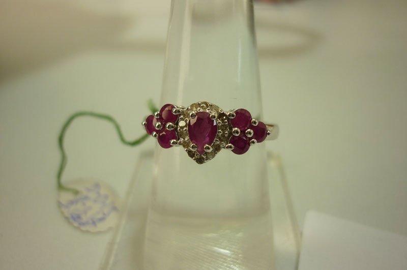 15.70 ctw Ruby and Diamond Ring .925 Sterling Silver: 15.70 ctw Ruby and Diamond Ring .925 Sterling Silver **|**|** 15.70 ctw Ruby and Diamond Ring .925 Sterling Silver; RUBY 1.14 CTW; DIAMOND 0.15 CTW ; MSRP: $630